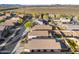 Aerial view of house with pool and surrounding desert landscape at 10808 W Cottontail Ln, Peoria, AZ 85383