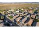 Aerial view of house and neighborhood, showing surrounding homes and streets at 10808 W Cottontail Ln, Peoria, AZ 85383