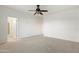 Bedroom with ceiling fan and en-suite bathroom access at 10808 W Cottontail Ln, Peoria, AZ 85383