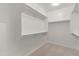 Large walk-in closet with double hanging rods at 10808 W Cottontail Ln, Peoria, AZ 85383