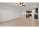 Open dining area with tile flooring and views of the kitchen at 10808 W Cottontail Ln, Peoria, AZ 85383