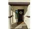 Inviting front entry with decorative wreath and welcoming doormat at 10808 W Cottontail Ln, Peoria, AZ 85383