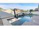 Inviting backyard pool with spacious patio and lounge chairs at 10808 W Cottontail Ln, Peoria, AZ 85383