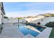 Stunning pool area with a clean design and a tranquil atmosphere at 10808 W Cottontail Ln, Peoria, AZ 85383