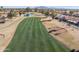 Golf course view with a pond and houses at 10846 E Navajo Dr, Sun Lakes, AZ 85248