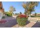 Landscaped backyard with golf course view at 10846 E Navajo Dr, Sun Lakes, AZ 85248