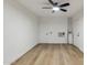 Bright bedroom with ceiling fan and window A/C unit at 10846 E Navajo Dr, Sun Lakes, AZ 85248