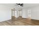 Bedroom with mirrored closet and access to bathroom at 10846 E Navajo Dr, Sun Lakes, AZ 85248