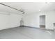 Interior garage with water heater and access door at 10846 E Navajo Dr, Sun Lakes, AZ 85248