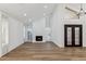 Living room with hardwood floors, fireplace and high ceilings at 10846 E Navajo Dr, Sun Lakes, AZ 85248