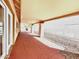 Long covered patio area with access to the interior, offering potential for outdoor living at 10846 E Navajo Dr, Sun Lakes, AZ 85248