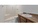 Bathroom includes shower, toilet and wood vanity at 11530 E Marguerite Ave, Mesa, AZ 85208