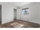 Bedroom with carpet, closet, and window offering natural light at 11530 E Marguerite Ave, Mesa, AZ 85208