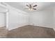 Bright bedroom with double door closet and ceiling fan at 11530 E Marguerite Ave, Mesa, AZ 85208
