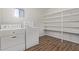 Laundry room with washer, dryer and shelving at 11530 E Marguerite Ave, Mesa, AZ 85208