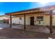 Covered patio with access to backyard and exterior of home at 11530 E Marguerite Ave, Mesa, AZ 85208