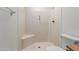 Clean shower with corner seat and neutral walls at 11530 E Marguerite Ave, Mesa, AZ 85208