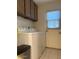 Laundry area with washer, dryer, and exterior access at 1160 E Cheryl Dr, Phoenix, AZ 85020