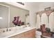 Bathroom with double sinks and a shower/tub combo at 1201 W Ducasse Dr, Phoenix, AZ 85013