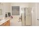 Bathroom with soaking tub, shower, and double vanity at 1201 W Ducasse Dr, Phoenix, AZ 85013