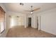Spacious bedroom with ceiling fan and tile floors at 1201 W Ducasse Dr, Phoenix, AZ 85013