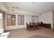 Dining room features tile floor and a view to the backyard at 1201 W Ducasse Dr, Phoenix, AZ 85013