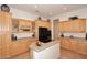 Large kitchen with extensive cabinetry and an island at 1201 W Ducasse Dr, Phoenix, AZ 85013