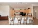 Kitchen with light wood cabinets and granite counters at 1201 W Ducasse Dr, Phoenix, AZ 85013