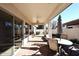 Covered patio with brick flooring and outdoor seating at 1201 W Ducasse Dr, Phoenix, AZ 85013