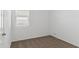 Bright bedroom with carpet and window coverings at 1413 W Hess Ave, Coolidge, AZ 85128