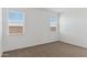 Simple bedroom with neutral walls and carpet flooring at 1413 W Hess Ave, Coolidge, AZ 85128