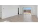 Spacious living area with sliding glass doors and backyard access at 1413 W Hess Ave, Coolidge, AZ 85128