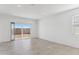 Bright living room with sliding glass doors to backyard at 1413 W Hess Ave, Coolidge, AZ 85128