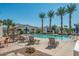 Relaxing resort-style pool with plenty of lounge chairs at 14200 W Village Pkwy # 2128, Litchfield Park, AZ 85340