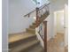 Staircase with wood handrail and carpet runner at 14905 W Ashland Ave, Goodyear, AZ 85395