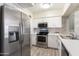 Stainless steel appliances in a contemporary kitchen at 15095 N Thompson Peak Pkwy # 1044, Scottsdale, AZ 85260