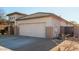 One-story house with a two-car garage and desert landscaping at 15345 W Jefferson St, Goodyear, AZ 85338