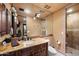 Spa-like bathroom with granite vanity and walk-in shower at 16117 E Shooting Star Trl, Fountain Hills, AZ 85268