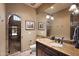 Bathroom boasts granite countertop, large mirror, and a walk-in shower at 16117 E Shooting Star Trl, Fountain Hills, AZ 85268