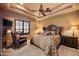 Spacious bedroom with a king-size bed and sitting area at 16117 E Shooting Star Trl, Fountain Hills, AZ 85268