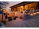 Elegant patio with fireplace and seating area, perfect for outdoor entertaining at 16117 E Shooting Star Trl, Fountain Hills, AZ 85268