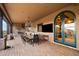 Outdoor patio with dining area and built-in grill at 16117 E Shooting Star Trl, Fountain Hills, AZ 85268