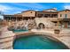 Expansive pool with waterfall and bridge feature at 16117 E Shooting Star Trl, Fountain Hills, AZ 85268