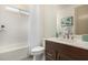 Clean bathroom with a shower/tub combo and modern vanity at 16884 W Pinchot Ave, Goodyear, AZ 85395