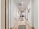 Light and airy hallway offering access to various rooms at 16884 W Pinchot Ave, Goodyear, AZ 85395