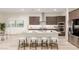 Modern kitchen with island, stainless steel appliances, and ample counter space at 16884 W Pinchot Ave, Goodyear, AZ 85395