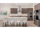 Eat-in kitchen with large island and stainless steel appliances at 16884 W Pinchot Ave, Goodyear, AZ 85395