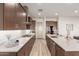 Modern kitchen with stainless steel appliances and large island at 16884 W Pinchot Ave, Goodyear, AZ 85395