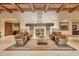 Relaxing lobby with a stone fireplace and leather chairs at 16884 W Pinchot Ave, Goodyear, AZ 85395