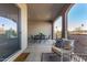 Relaxing covered patio with seating area and dining table at 16884 W Pinchot Ave, Goodyear, AZ 85395